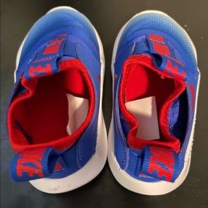 Blue and red Nike. Toddle boy size 5.